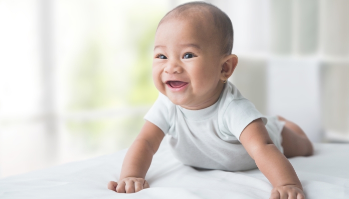 Happy baby while tummy time.