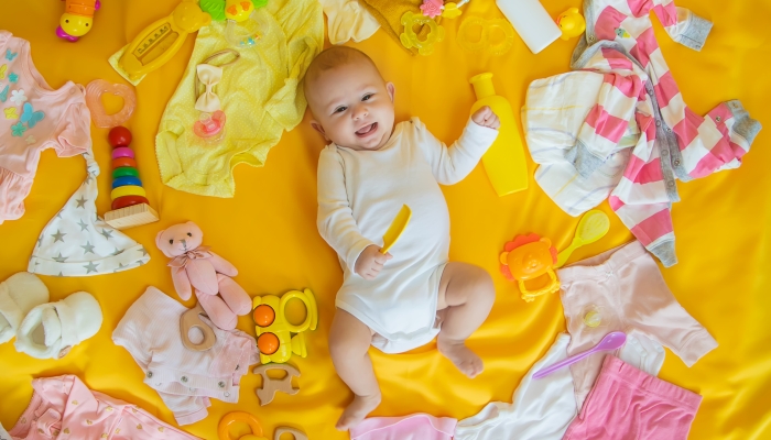 Baby with clothes and accessories.