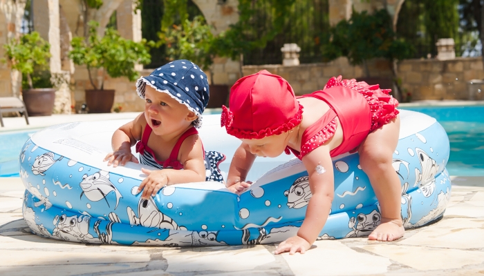 Children playing in pool.