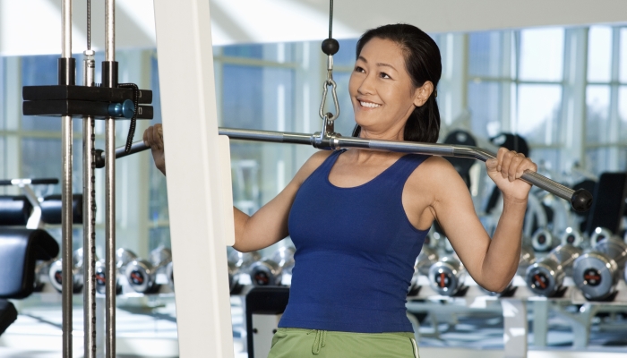 Woman exercising in the gym.