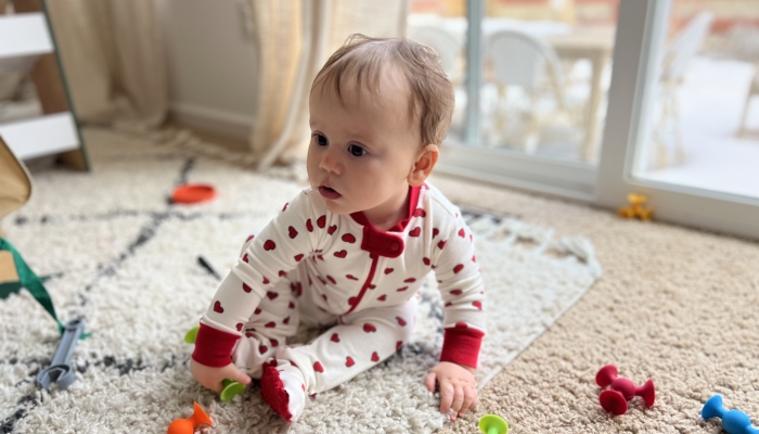 Very cute little boy in his pajamas.