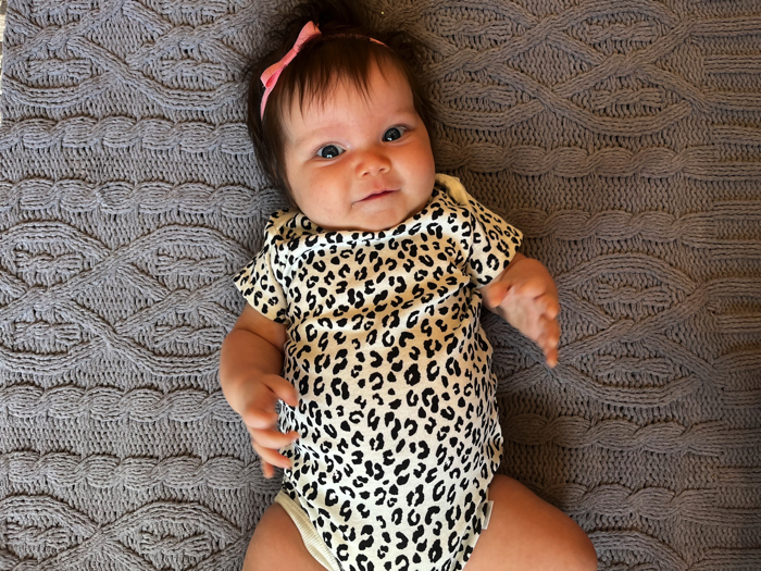 Gerber baby onesie, leopard print.