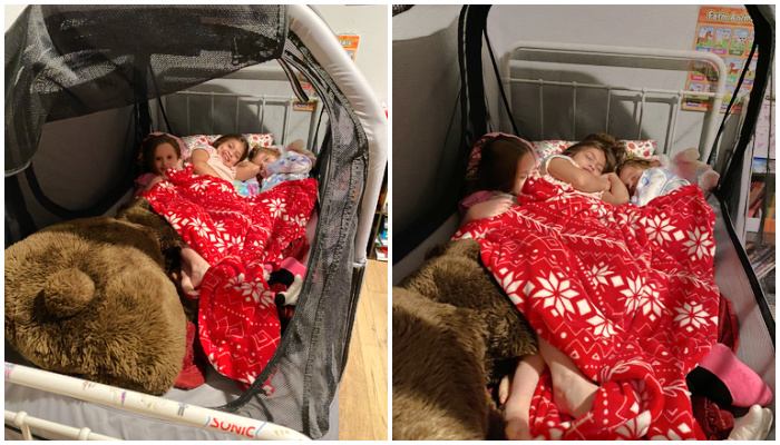 Rachel's daughters snuggled safely in their Safety Sleeper bed.