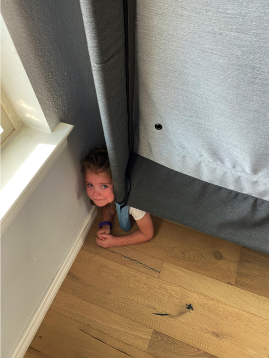 Rachel's daughter trapped by her old bed.