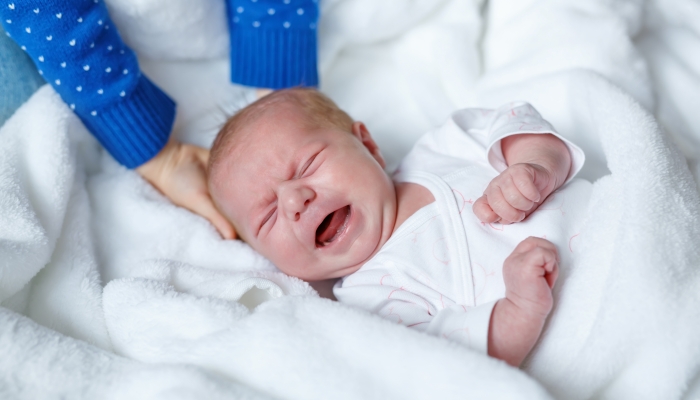 New born child, little girl crying.