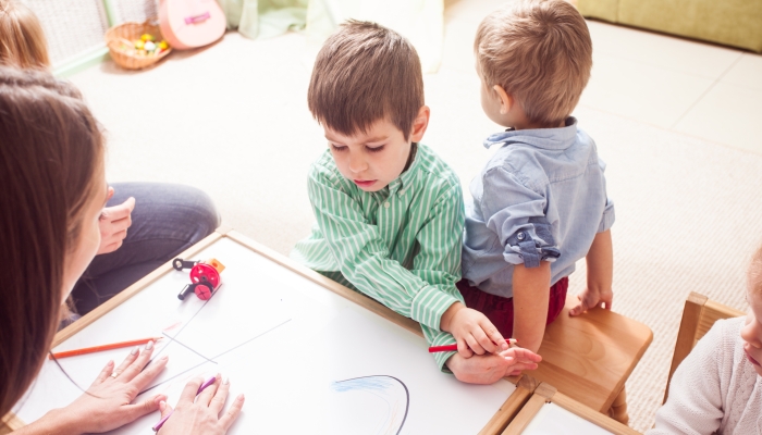 Preschoolers learn letters.