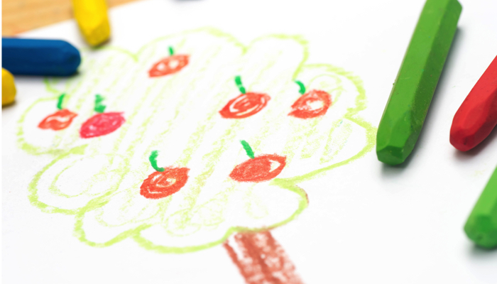 A child's drawing of an apple tree
