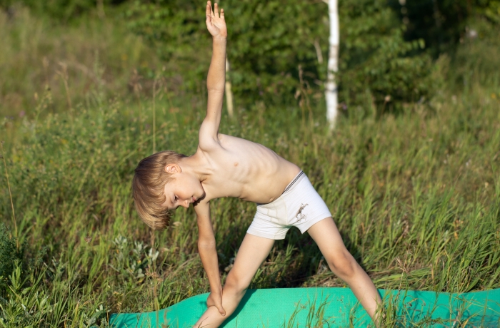 Extended triangle pose.