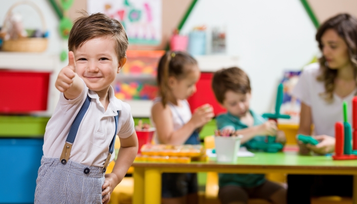 Preschool Children and Teacher in Classroom.