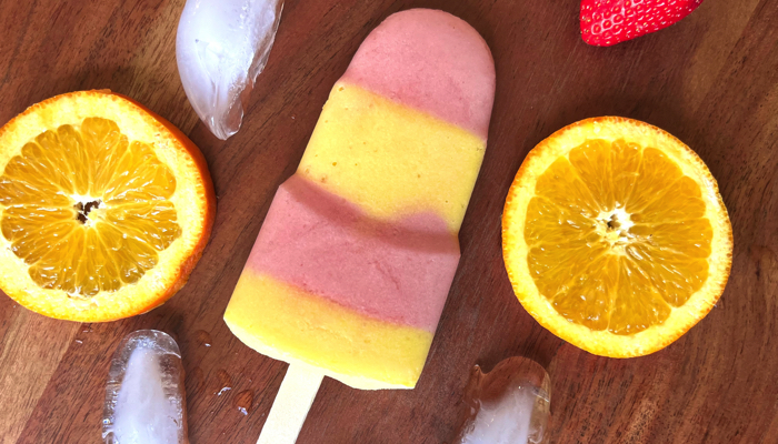 Strawberry orange coconut popsicles.