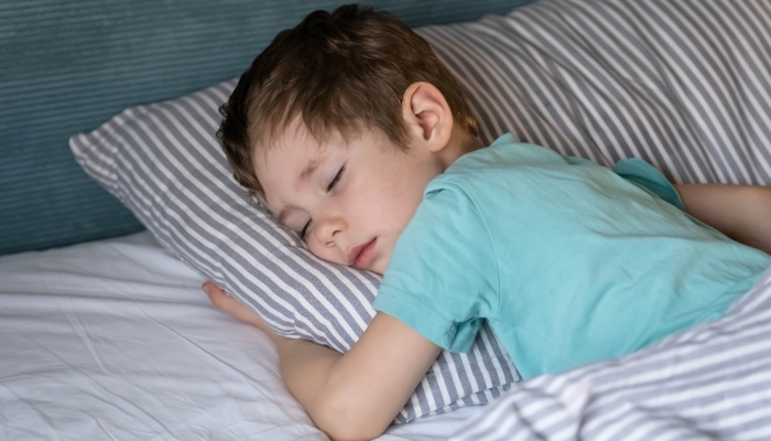 Little baby napping in the nursery.