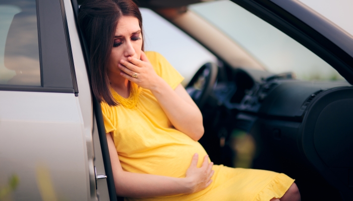 Pregnant Woman Traveling Feeling Nauseated.