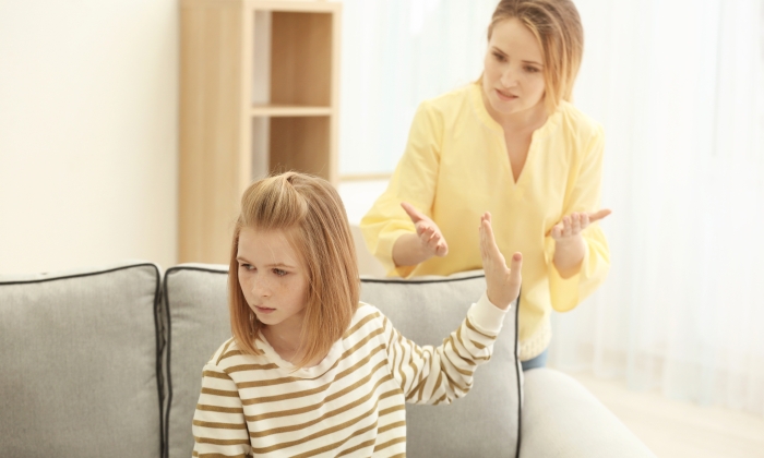 Quarrel between mother and daughter at home.