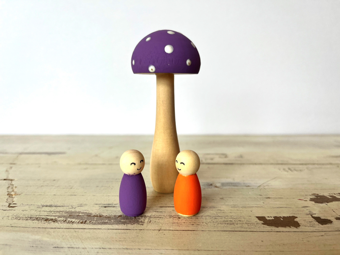 Pretend play with the mushrooms and peg dolls.