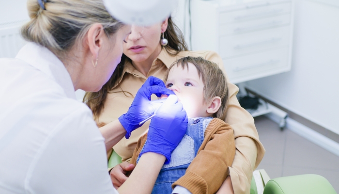 A child at the dentists appointment.