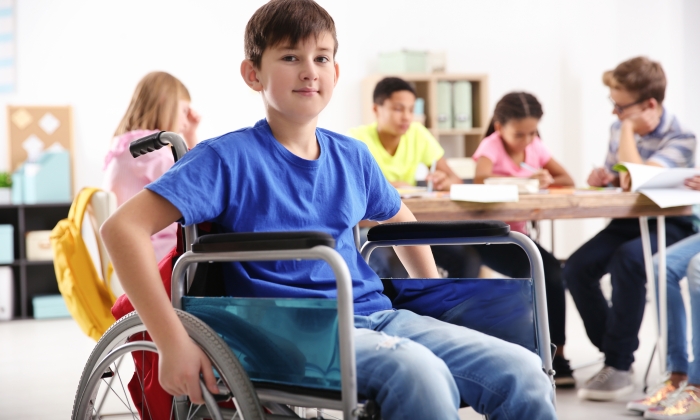 Boy in wheelchair at school.