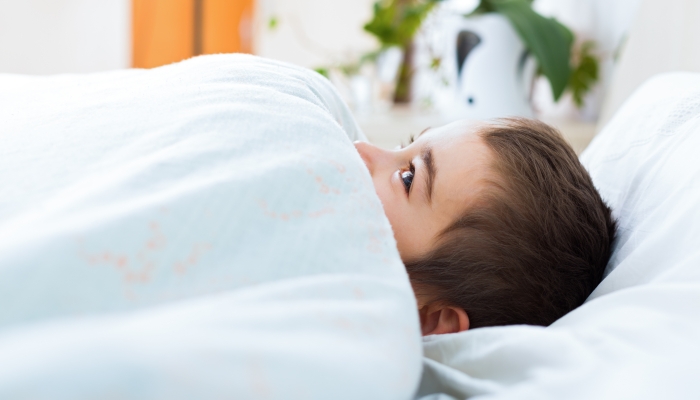 Child having hard time to get a sleep.