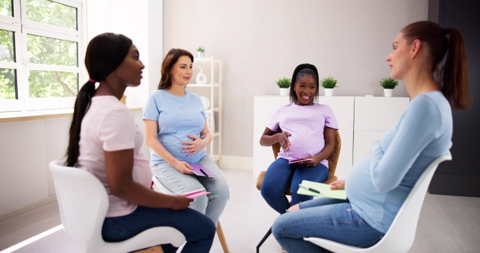 Pregnant Expecting Women Group Class. Pregnancy And Maternity