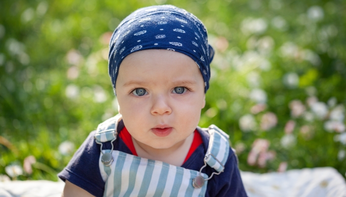 Closeup portrait of baby boy with big eyes.