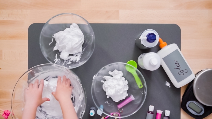 Kids project with colorful fluffy shaving cream.