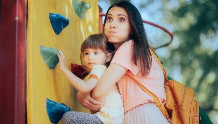 Mother Trying to Take Her Child Home from The Playground.