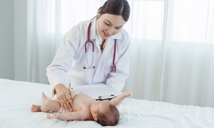 Asian woman who is a pediatrician.