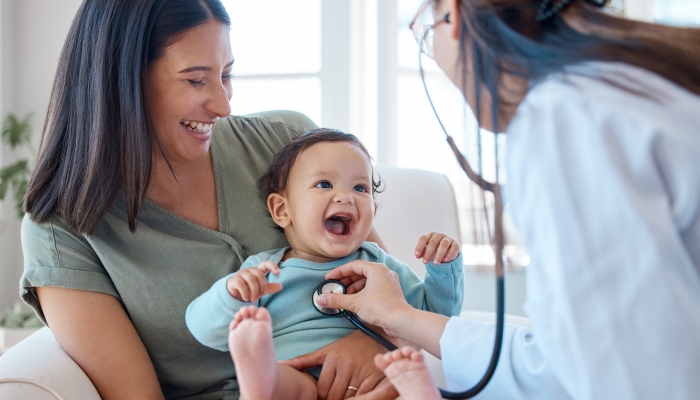 Mother, baby and stethoscope of pediatrician for healthcare consulting.