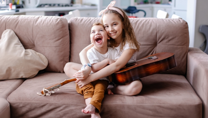 Child with cerebral palsy with family in rehabilitation.