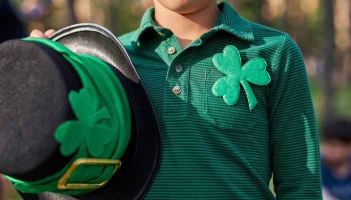 Little boy dressed for St Patricks Day party.