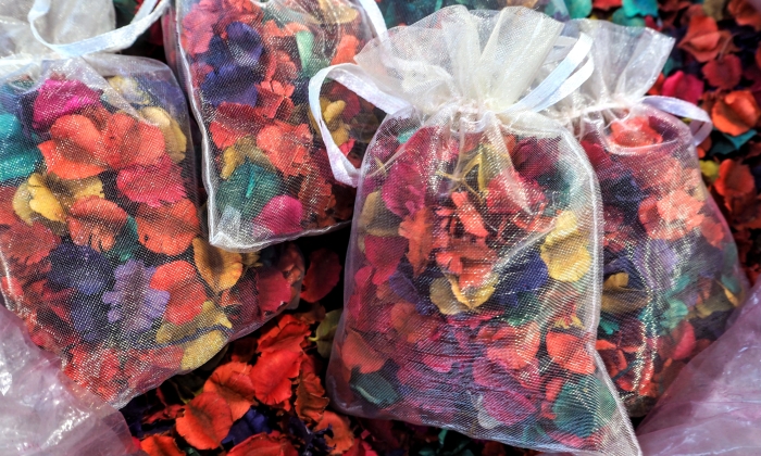 Potpourri or dried petals flowers colorful in cloth bags.