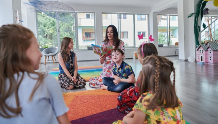 Reading time in an elementary school or kindergarten.