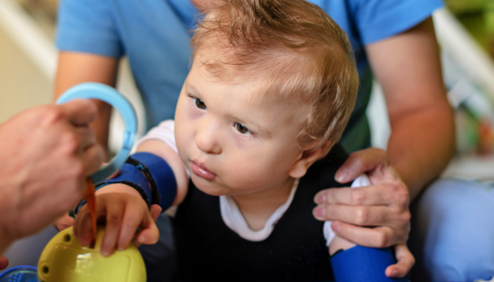 A toddler receiving early intervention services.