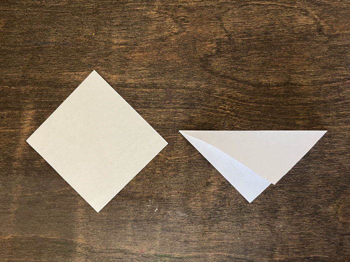 Folding hanging paper snowflakes.