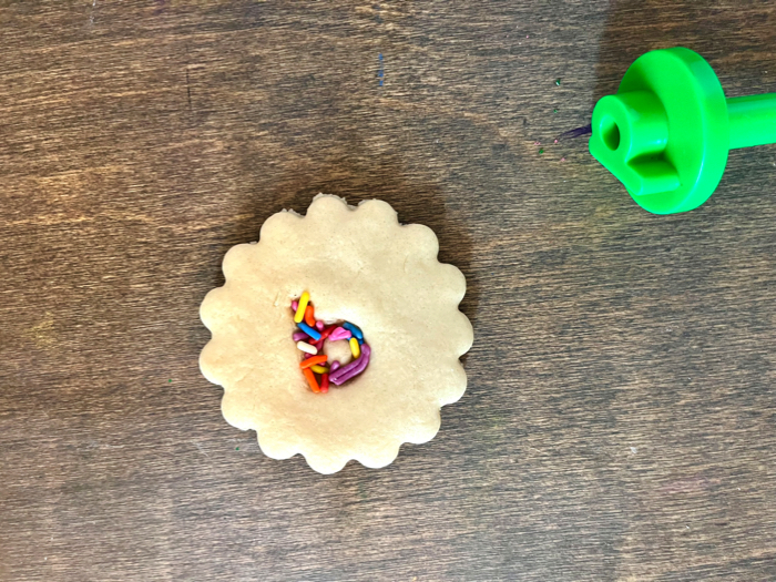 A tactile alphabet cookie with a b stamp.