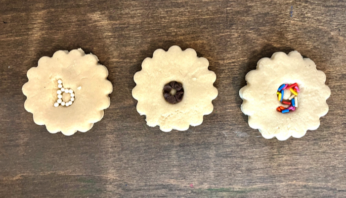 Three tactile alphabet cookies spelling B O G