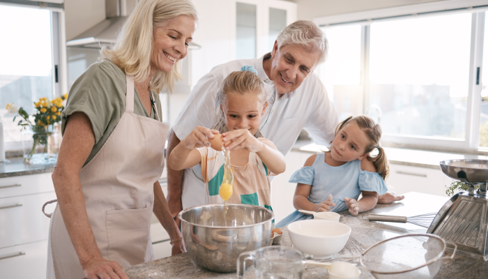 Grandparents or cooking kids learning a bakery pudding or cookies recipe.