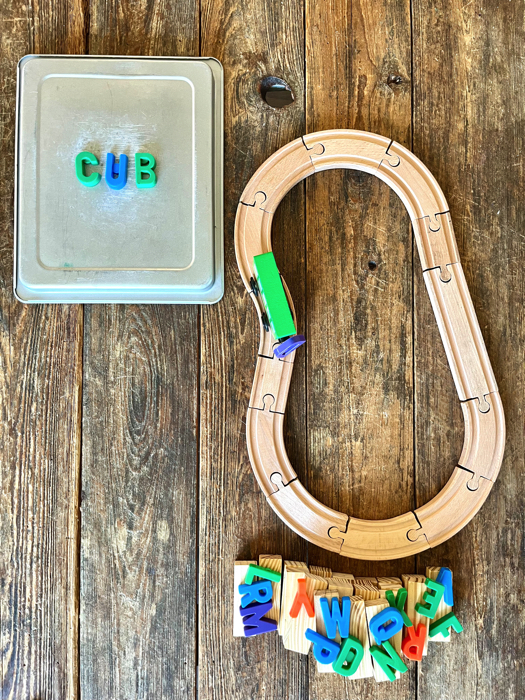 Alphabet Train Activity carrying a letter down the tracks.