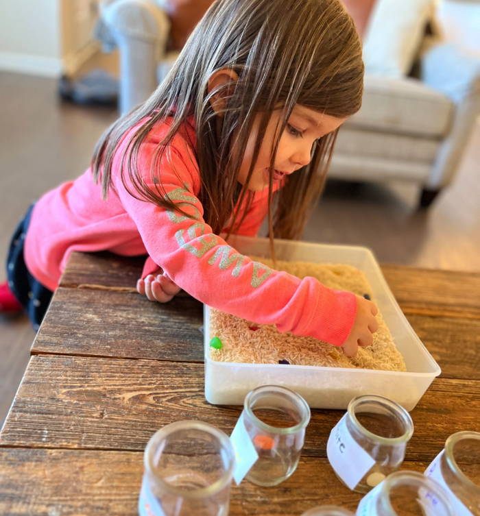 Jelly Bean Sensory Bin and Color Sorting playing.